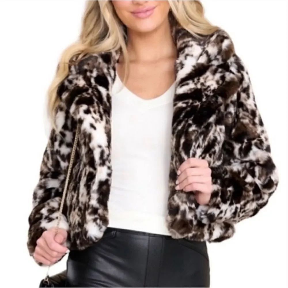 Free People Band of The Free Open Front
Faux Fur Ivory/Black Jacket(Size Medium)